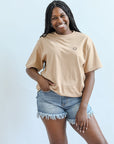 Smiley face tee for women from Favored And Common in NC