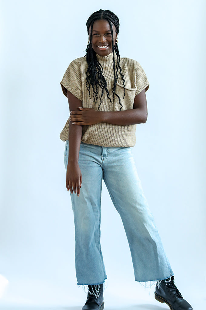 Tan sweater tunic with jeans from Favored and Common