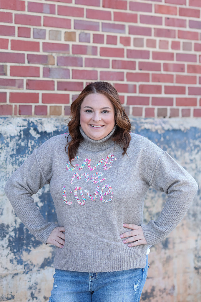 Taupe mock neck stitched sweater from Favored and Common in NC