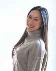 Taupe sweater with bright multi color shoulder stitching from Favored and Common in NC