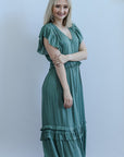 Teal green satin v-neck midi dress from Favored and Common in NC