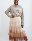 Tiered mesh skirt with turtle neck sweater from Favored And Common in NC