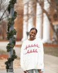 White Falalalala Christmas cable knit sweater from Favored And Common