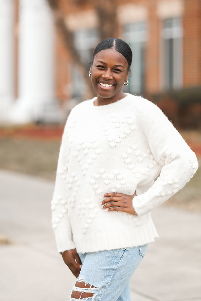 White fuzzy knit heart pull over sweater from Favored And Common