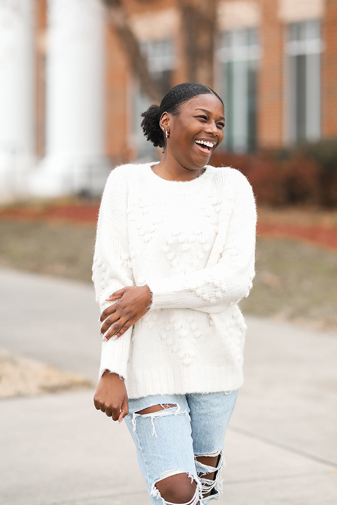 White pull over heart sweater from Favored And Common