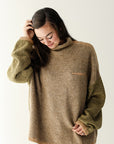 Olive green and brown color block mock neck sweater from Favored And Common in NC