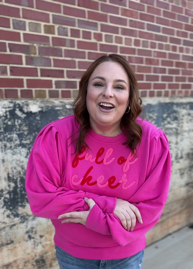 Pink full of cheer crew neck sweatshirt try on video from Favored And Common in NC