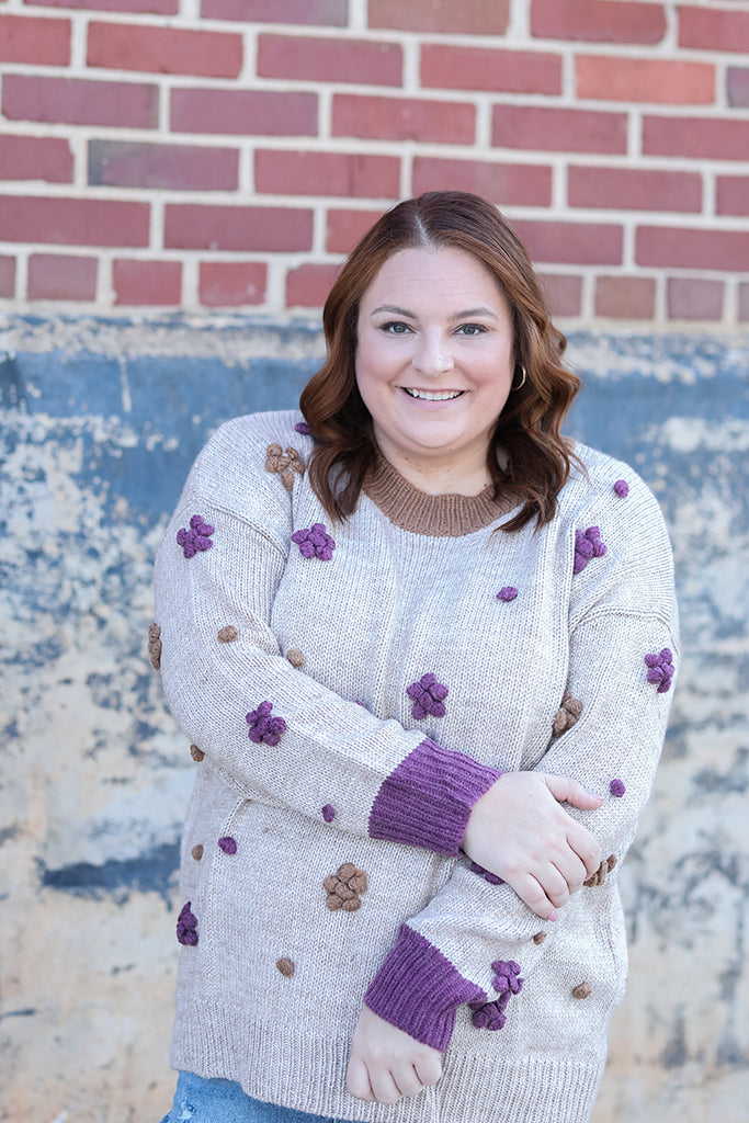 Brown and green 3-D knit floral sweater from Favored And Common in NC