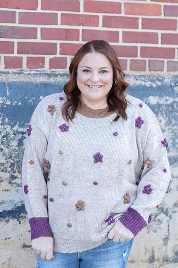 Purple and brown knit floral sweater from Favored And Common in NC