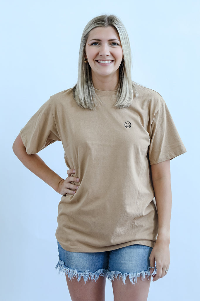 Smiley face tee for women from Favored And Common in NC