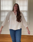 Cream linen blouse from Favored and Common in NC