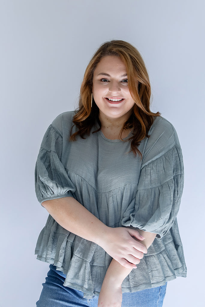 Flowy steel blue blouse from Favored And Common in NC