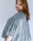 Flattering tiered blouse from Favored And Common in NC