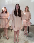 Pink neutral flowy dress from Favored And Common