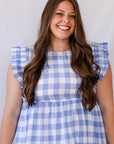 Blue and white tiered mini dress with ruffle sleeves from Favored And Common in NC