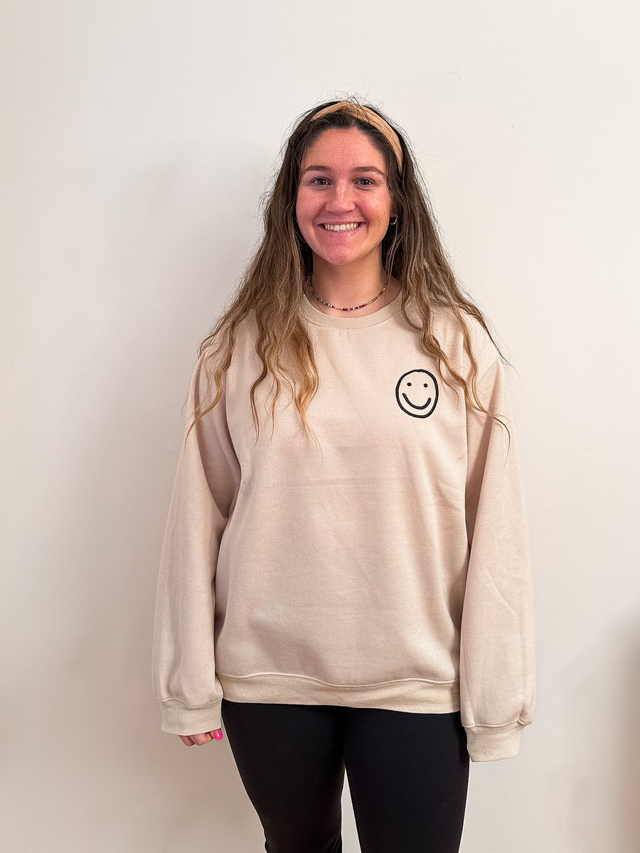 Embroidered smiley face crew neck for women from Favored And Common