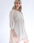 Flowy mini dress with baby ruffle details from Favored And Common