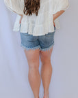 High waisted stretchy denim shorts with frayed hem from Favored and Common