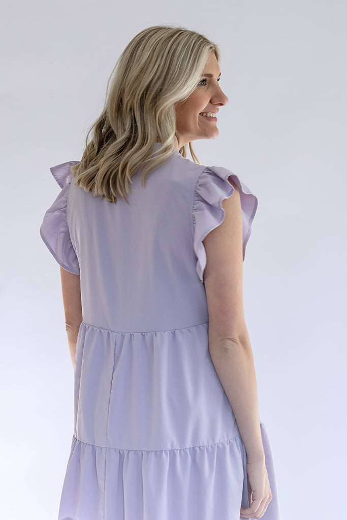 Lavender ruffle sleeve midi dress from Favored And Common