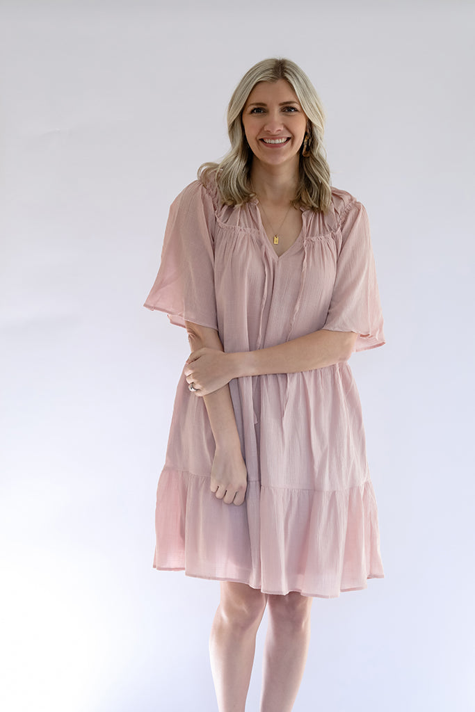 Pink textured shirring ruffle yoke mini dress from Favored And Common