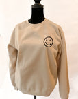 Taupe embroidered smiley face crew neck sweatshirt for women from Favored And Common