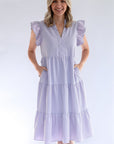 Lavender tiered midi dress with pockets from Favored And Common online boutique