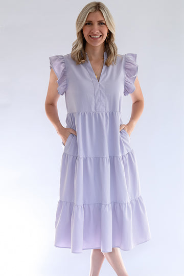 Lavender tiered midi dress with pockets from Favored And Common online boutique