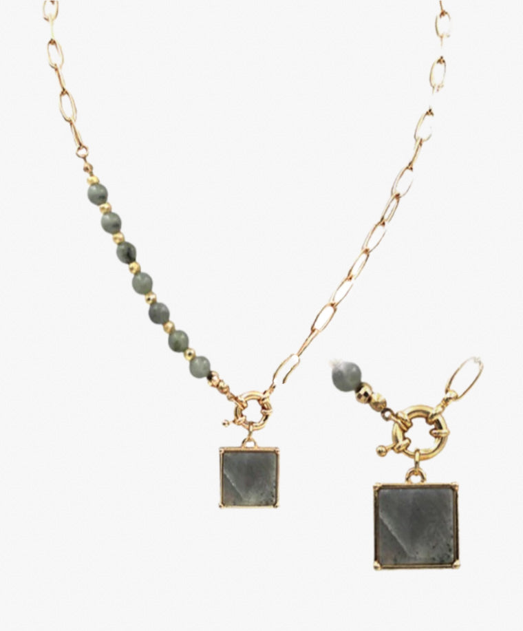 Gold chain necklace with grey beaded accents and square charm from Favored And Common