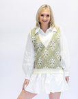 White long sleeve collared mini dress from Favored And Common in NC