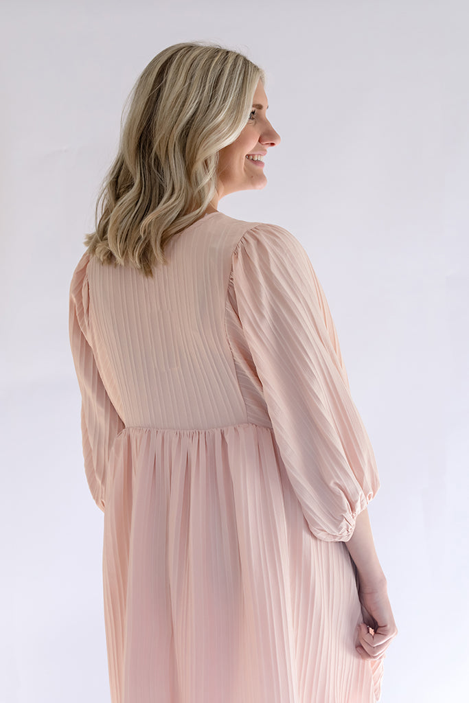 Women's textured blush pink dress outfit from Favored and Common