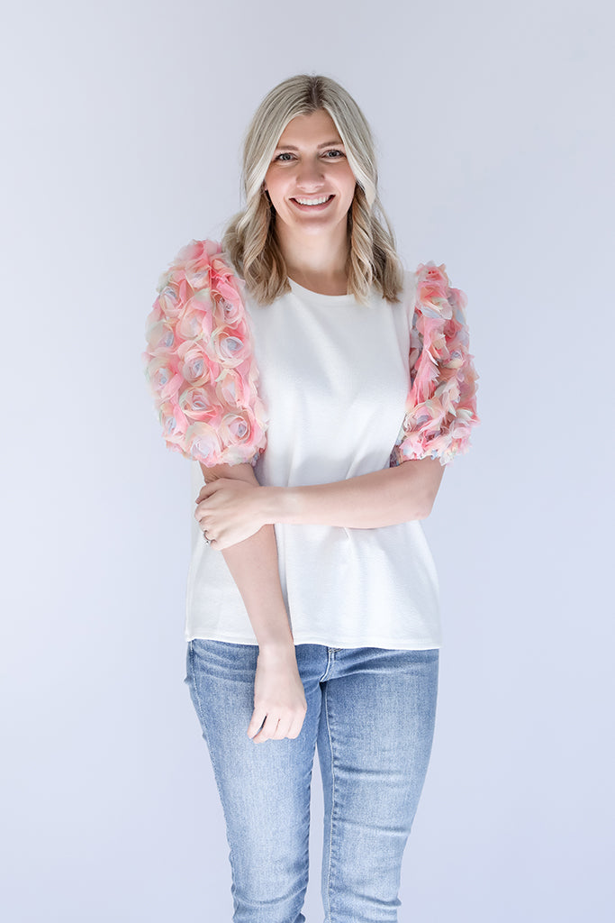 Women's pink floral top from Favored And Common