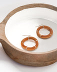 Womens wooden circle statement earrings from Favored and Common in NC