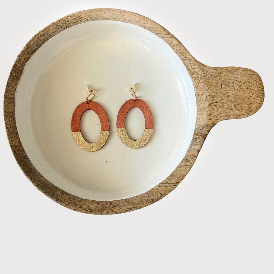 Wooden dangle earrings with gold accents from Favored and Common in NC