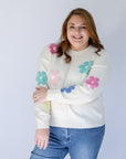 Light weight white pastel daisy print sweater for women from Favored And Common in NC